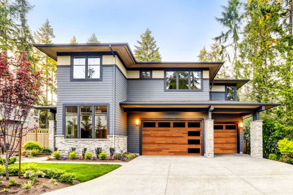 House with contemporary garage doors